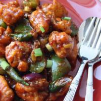 Chilly Chicken · Boneless chicken sauteed with green peppers, onions & hand made chilly sauce.