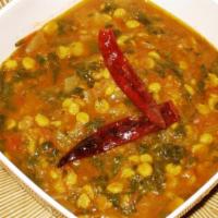 Channa Palak Daal · Spinach cooked with yellow lentil  in light cream sauce.
