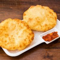 Bhature - 2 pcs · 2 deep-fried bhature made with all purpose flour goes with every dish.