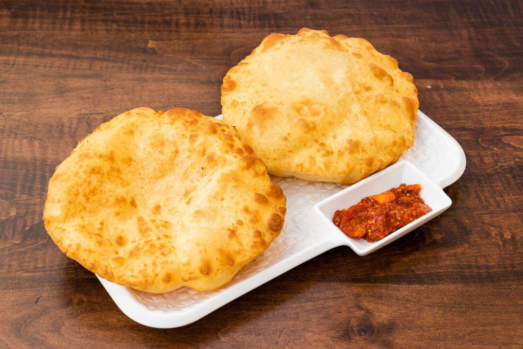 Bhature - 2 pcs · 2 deep-fried bhature made with all purpose flour goes with every dish.