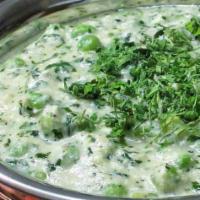 Matar Methi Malai · Fenugreek leaves and green peas cooked in a rich creamy gravy.