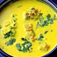 Punjabi Kadi Pakora · A stew made with yogurt and chickpea flour and seasoned with spice.