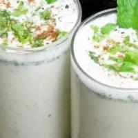Masala Chhaachh (Buttermilk) · Popular Indian Drink made with fresh yogurt, masala and mint.