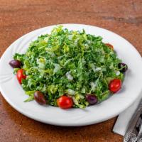 Mykonos Salad · Shredded romaine, scallions, dill, imported feta, tomatoes, Kalamata olives and EVOO.