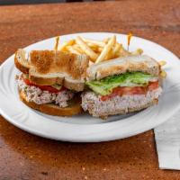 Open Tuna Melt Sandwich · On a rye bread with grilled tomatoes and melted American cheese. Served with french fries.