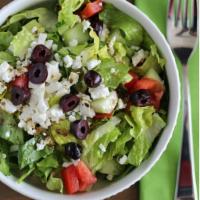 Greek Salad · Served with choice of dressing. Add extras for an additional charge.