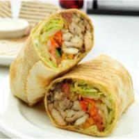  Chicken Shawarma Wrap · Marinated grilled chicken, pickles, garlic sauce. Make it Arabi style plate: shawarma with s...