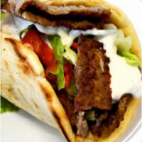 Gyro Wrap · Beef, tomatoes, lettuce and tzatziki. Wrapped with a Greek pita. 