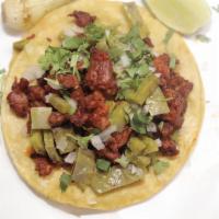 2 Tacos de Carne Enchilada  · Spicy pork.