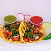 2 Tacos Chorizo  · Mexican sausage. Chopped fresh cilantro, white onion and cactus leaves