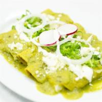 5 Enchiladas Verdes Pollo · 5 chicken tomatillo sauce enchiladas. Topped with lettuce, radish, sour cream and cotija che...