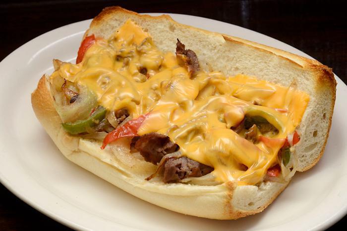 Philly Cheesesteak Hero · Made with peppers and onions.