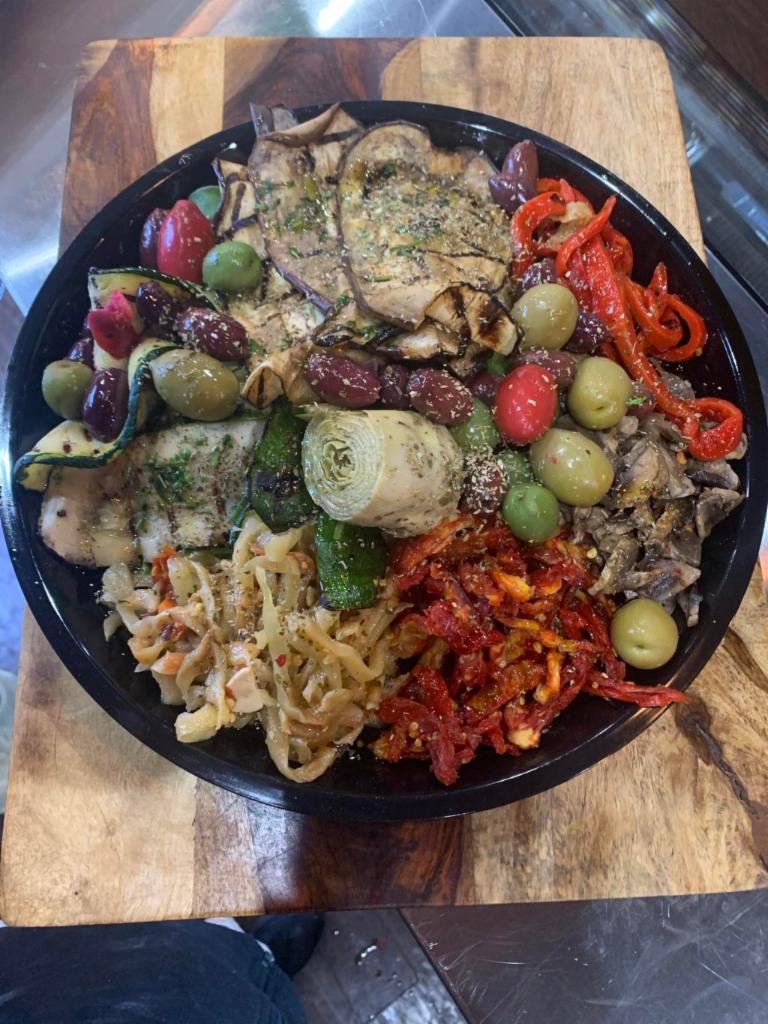 Platter No. 6 · Vegetariano, portobello, sun-dried tomatoes, grilled zucchini, grilled eggplant, mixed olives and roasted peppers.