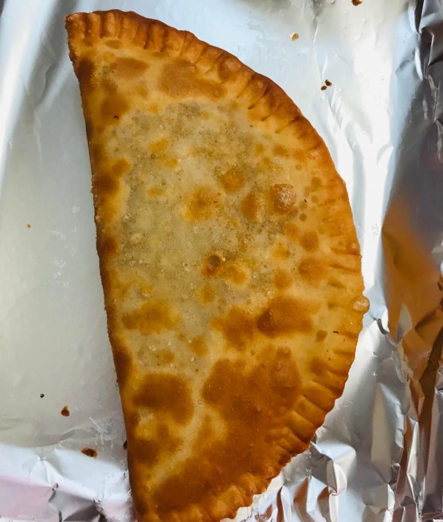 Empanadas · Empanadas de queso o pollo. Crescent shaped turnover. 