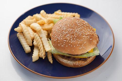 N5. BBQ Chicken Burger · BBQ chicken, tomato, onion, and lettuce on bun.