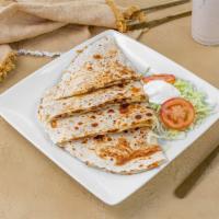 #12 Quesadilla · Choice of meat, cheese, tortilla, lettuce, tomato, and sour cream.