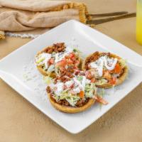 #6 Three Sopes · Sope, Beans, Meat, Lettuce, Tomato, Cheese, Sour Cream