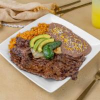 #20 Carne Asada Plate · Carne Asada, Rice, Beans, Onions, Jalapeño, and tortillas.