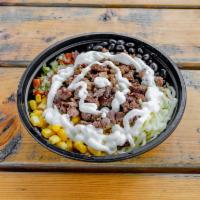 Rancho Baja Bowl · Bowl with your choice of meat, Mexican jasmine rice, seasoned black beans, kernel corn, chih...