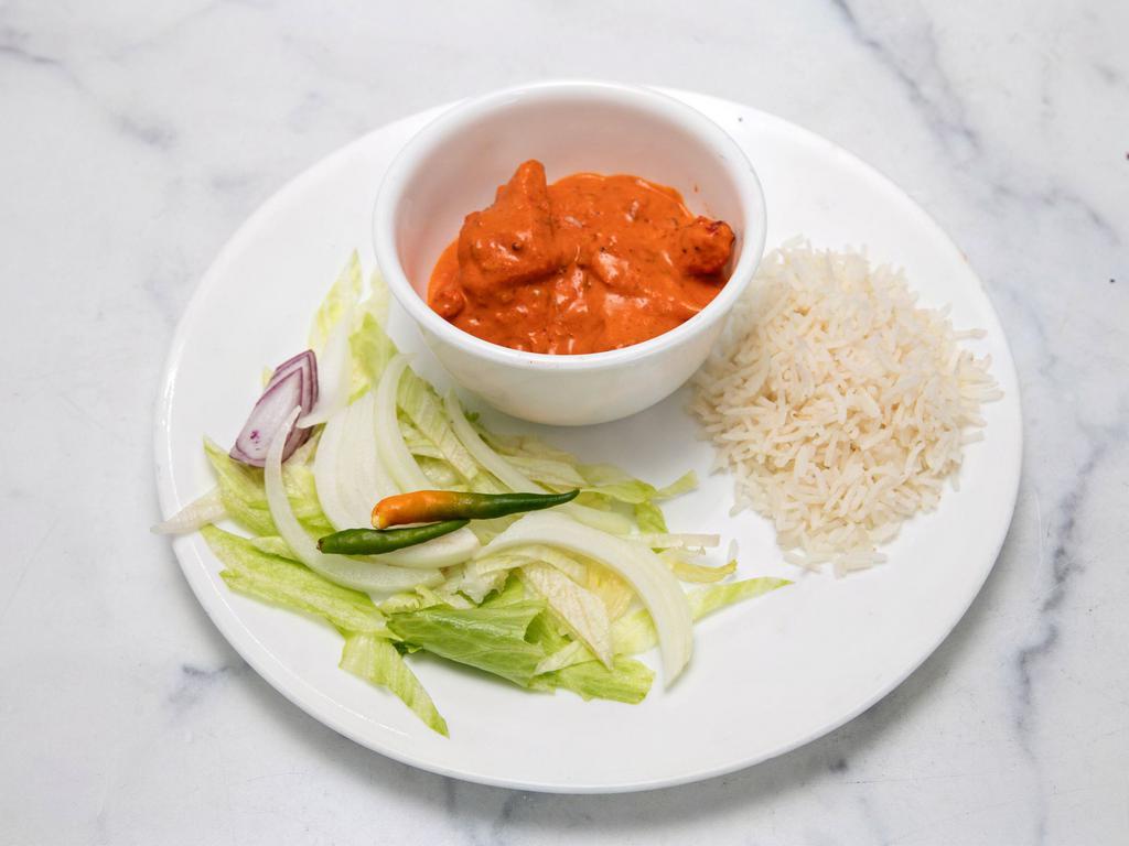 Chicken Tikka Masala · Marinated and spiced chicken in curry. 