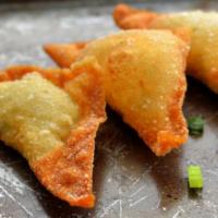 12. Crab Rangoon · 8 pieces.only cheese and onion in side light fired