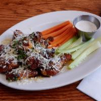 Garlic Parmesan Honey Chicken Wings · Served with carrots celery and a choice of homemade ranch or blue cheese dressing.