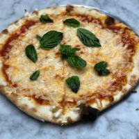The Vegan Cheese Pizza · Daiya vegan cheese, red sauce and fresh basil.