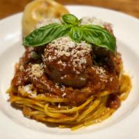 Linguini & Meatballs · Served with homemade jumbo meatballs and topped with Parmesan cheese. Served with a garlic k...