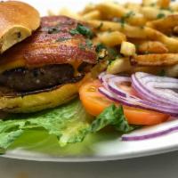 The Grand Pub Cheeseburger · 1/2 lb. grass fed beef burger with sharp cheddar cheese, bacon, pickled tomato, and lettuce ...