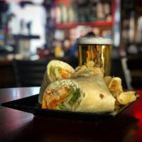 Buffalo Chicken Wrap · Choice of either garlic Buffalo, mild or hot sauce, lettuce, provolone, and tomatoes. Drizzl...