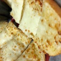 Garlic Bread · A hearty portion of bread brushed with garlic oil, and covered with provolone, mozzarella, a...