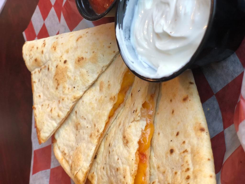 Quesadilla · Cheddar cheese and salsa in a flour tortilla. Served with a side of salsa and sour cream. Add seasoned ground beef or chicken for an additional charge.