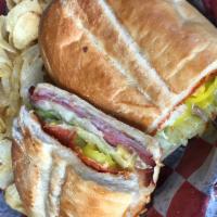 The Great 1 Sandwich · Italian salami, pepperoni, ham, provolone, banana peppers, lettuce, tomatoes, and Italian dr...