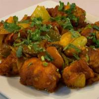 Chicken Chili ( choose spicy level) · Spicy Nepalese style chicken tender, cooked with chili, onion, green pepper and tomato.