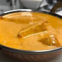 Chicken Tikka Masala ( choose spicy level ) · Boneless chicken marinated in yogurt, cooked in creamy tomato sauce.