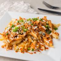 Buffalo Chicken Fries · Crispy fries smothered with Mexican blend cheese, shredded chicken seasoned in our signature...
