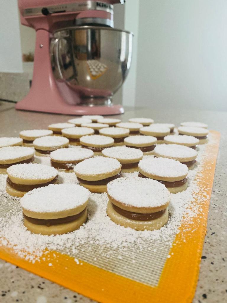 Alfajores · Delicious Argentina style Alfajores filled with dulce de leche and cover with coconut.