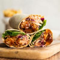 6. BBQ Wrap  · Sliced BBQ chicken breast, avocado, Romaine Jack cheese and sun dried tomatoes.  