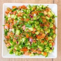 Israeli Salad · cucumbers, tomatoes, red onions ＆ lemon vinaigrette