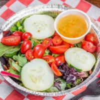 Side Salad · Romaine mix, tomatoes, cucumber, carrots, and red cabbage.