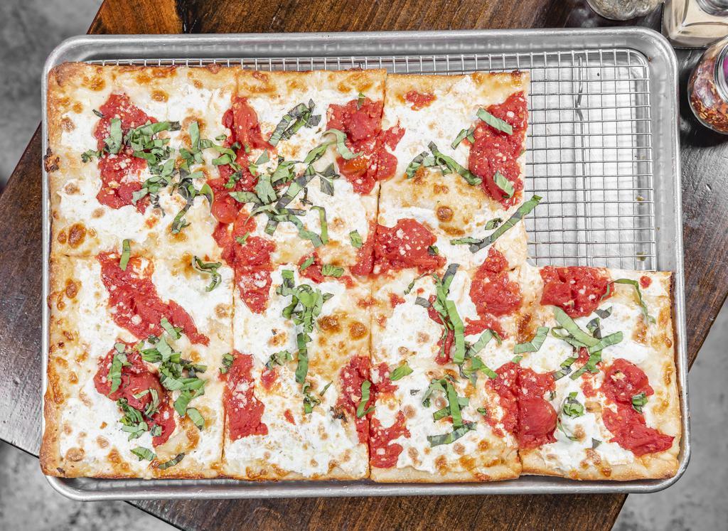 Grandma Traditional Square Pizza · Fresh and shredded mozzarella, crushed tomatoes, garlic and parm.
