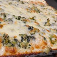 Grandma Spinach Artichoke Pizza · Creamy spinach and artichoke sauce topped with mozzarella.