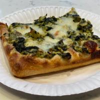 Spinach Artichoke Pizza Slice SQ · Creamy Spinach & Artichoke Sauce with Mozzarella