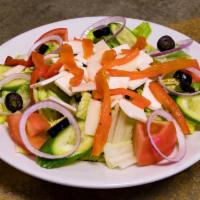 Mediterranean Salad · Romaine and iceberg mix, sharp provolone, cucumbers, olives, red onions, tomatoes and roaste...