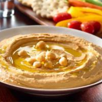 Hummus  (D, E, G, V) · chickpeas, tahini paste, lemon, garlic  & Olive oil