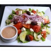 Greek Salad (E, G, V) · Romaine lettuce, cucumber, tomatoes, onion, olives, and feta cheese topped with olive oil vi...