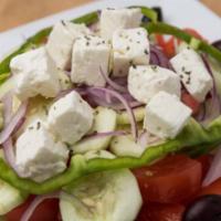 Horiatiki Salad (E, G, V) · tomatoes, cucumbers, olives, red onions, green peppers, feta cheese & Olive oil vinagrette