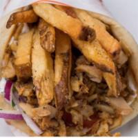 Chicken Gyro Pita · Served in the traditional Greek way Tomatoes, Onions, Tzatziki & a handful of fries in a pita