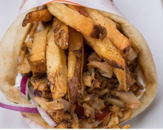 Grilled Chicken Breast Pita · Served in the traditional Greek way Tomatoes, Onions, Tzatziki & a handful of fries in a pita