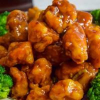 S1. General Tso's Chicken · Chunks of boneless chicken deep fried than sauteed in Hunan style. Hot and spicy.
